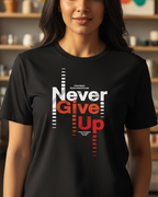 Woman wearing a black t-shirt with 'Never Give Up' text in a casual setting.