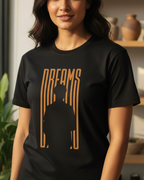 Woman wearing a black t-shirt with a graphic design in a home setting