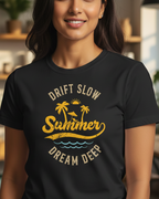 Woman wearing a black t-shirt with yellow and white text and graphics in a casual setting.