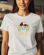 Woman wearing a white t-shirt with a colorful graphic design in a casual setting