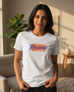 Woman wearing a white t-shirt with colorful text in a living room