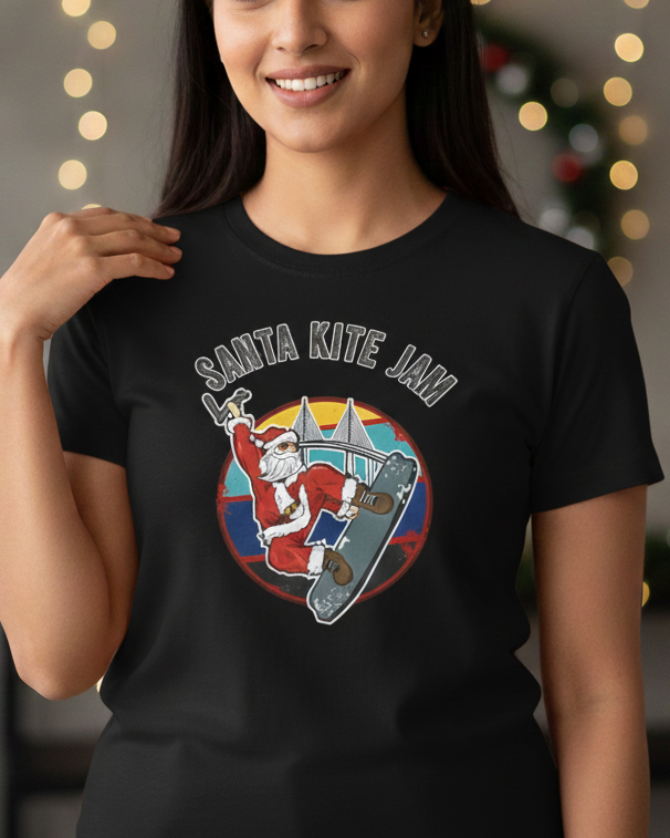 Women wearing a black t-shirt with 'Santa Kite Jam' design in a festive indoor setting.