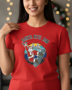 Women wearing a red 'Santa Kite Jam' t-shirt with a Christmas tree in the background.