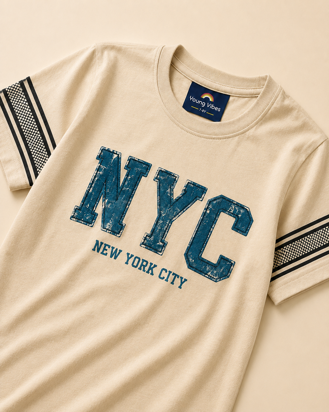Yellow T-shirt with denim NYC print placed in light beige background