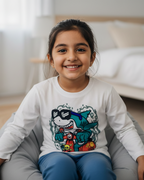 Young girl sitting on a bean bag chair in a bedroom wearing a white shirt with a colorful design.