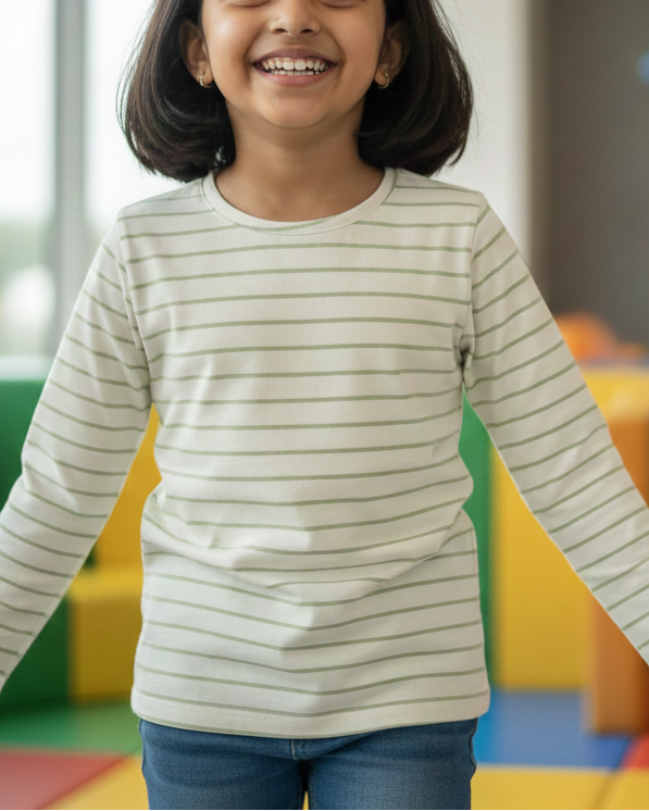 Young girl standing in a colorful indoor play area