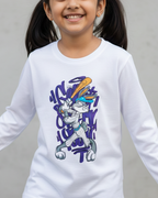 Young girl wearing a white long-sleeve shirt with a colorful graphic design on a gray background