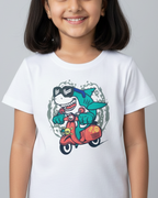 Young girl wearing a white t-shirt with a cartoon design on a gray background