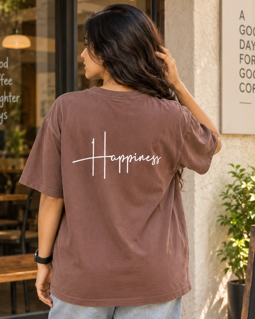 Young woman wearing “Happiness” HD print Brown Oversized T-shirt which of back pose 